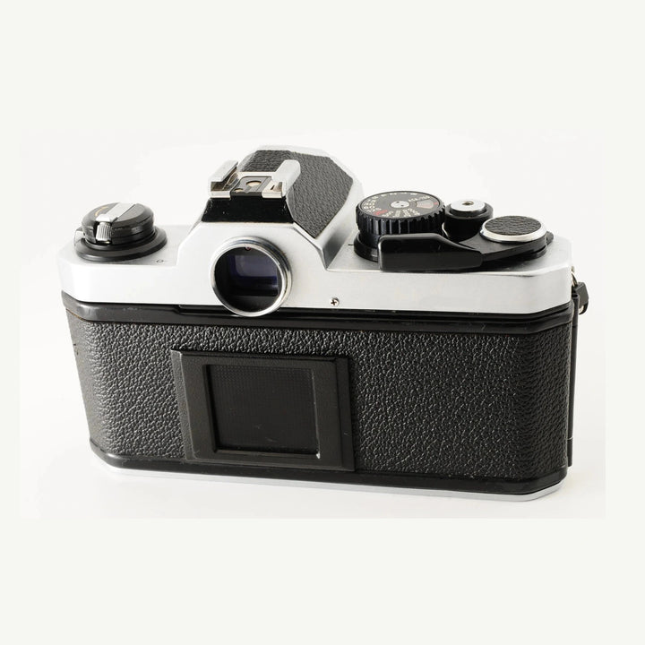 Rear view of Nikon FM2 mechanical SLR film camera showing rewind knob and exposure metering dial at ClubCamera.com