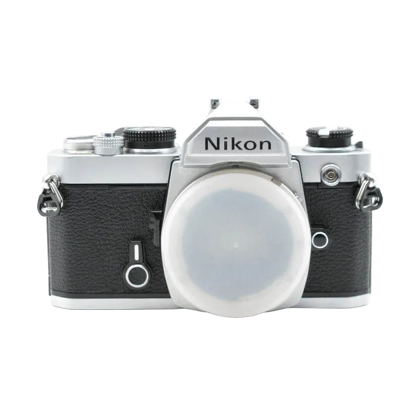 Front view Nikon FM body only with lens cap and strap lugs at ClubCamera.com