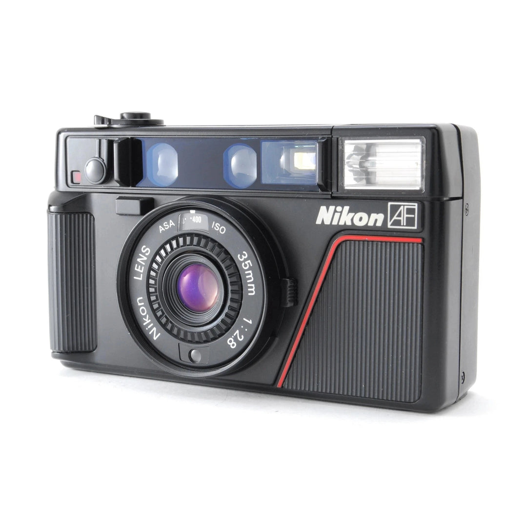 Nikon L35AF 35mm f/2.8 autofocus film camera front view with purple lens coating at ClubCamera.com