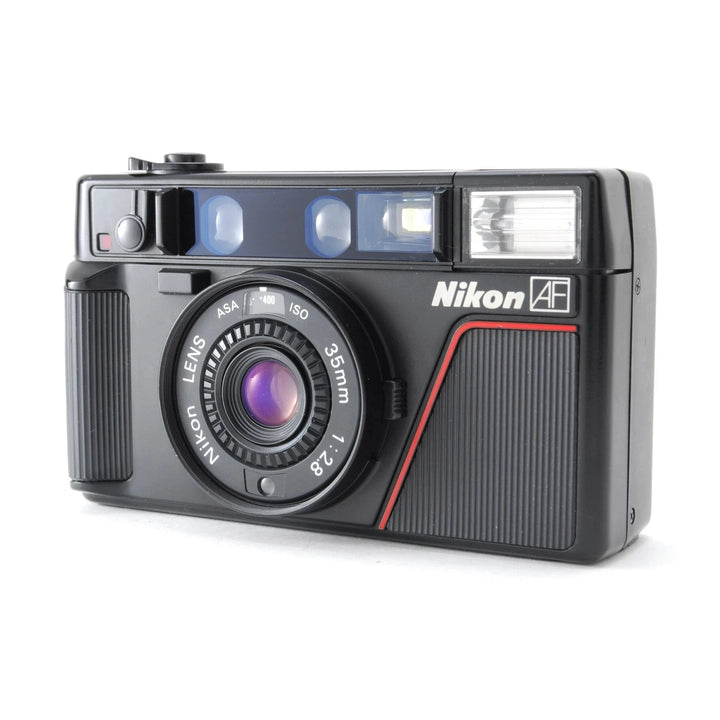 Nikon L35AF 35mm f/2.8 autofocus film camera front view with purple lens coating at ClubCamera.com