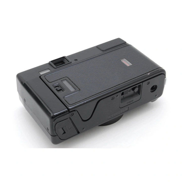 Rear view of black Nikon L35AF film camera showing rewind dial and battery compartment by ClubCamera.com