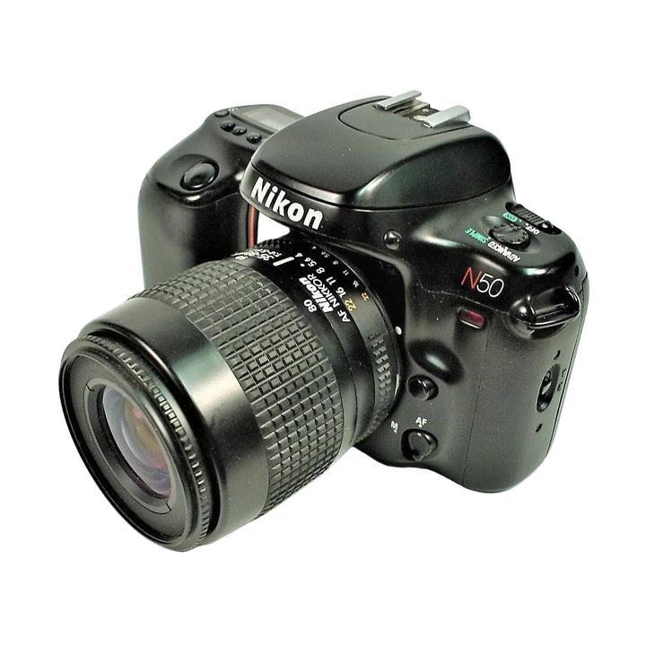 Front angle of black Nikon N50 35mm SLR film camera with AF Nikkor 35-70mm zoom lens and red logo from ClubCamera.com