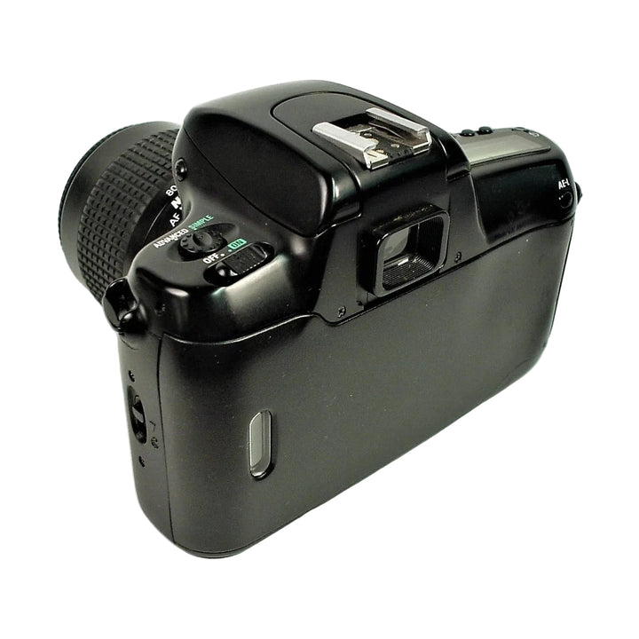 Rear view of black Nikon N50 autofocus SLR film camera showing viewfinder, hot shoe, and AE-L button sold by ClubCamera.com