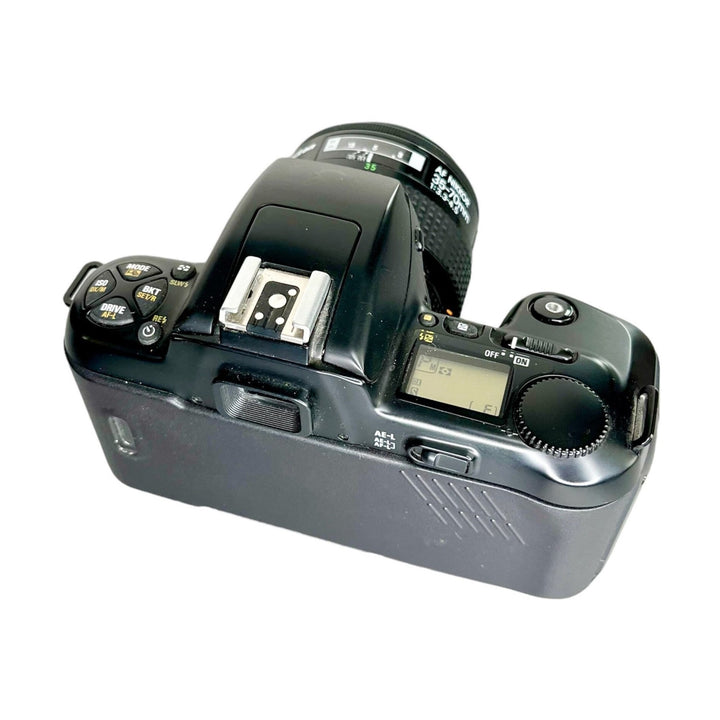 Top view of Nikon N6006 SLR controls and mode dial at ClubCamera.com