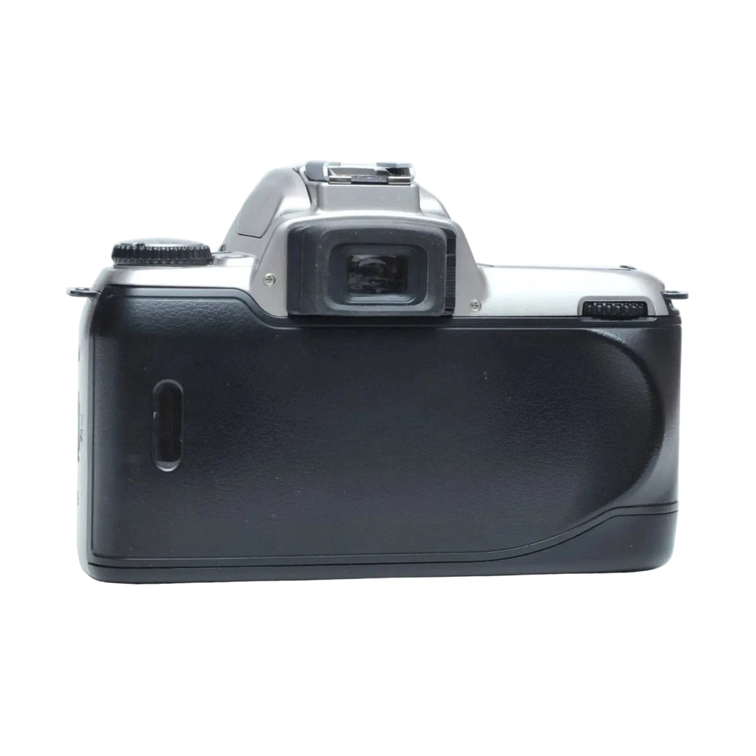 Rear view of black textured leatherette grip on silver Nikon N65 35mm SLR film camera body at ClubCamera.com