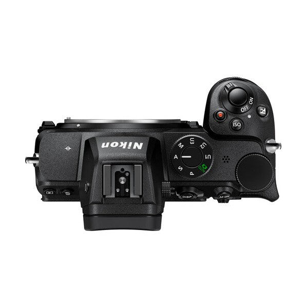 Top view of black Nikon Z5 DSLR showing mode dial and hot shoe at ClubCamera.com