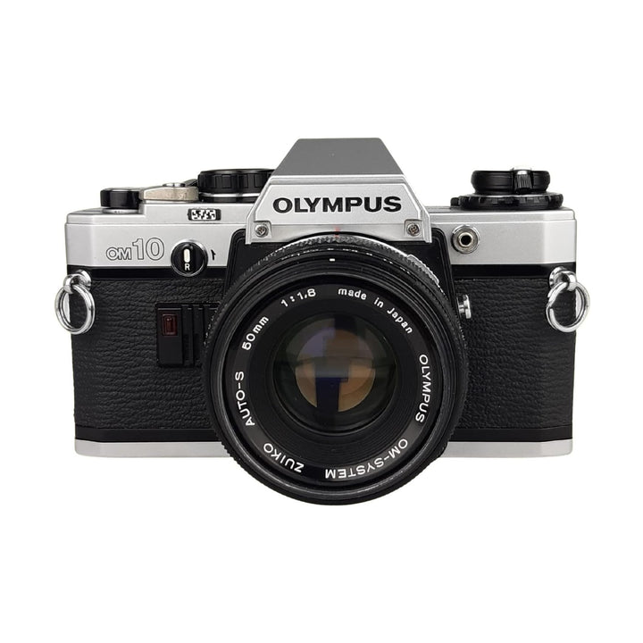 ClubCamera full front view of silver Olympus OM-10 SLR film camera with red rewind indicator and Zuiko 50mm lens