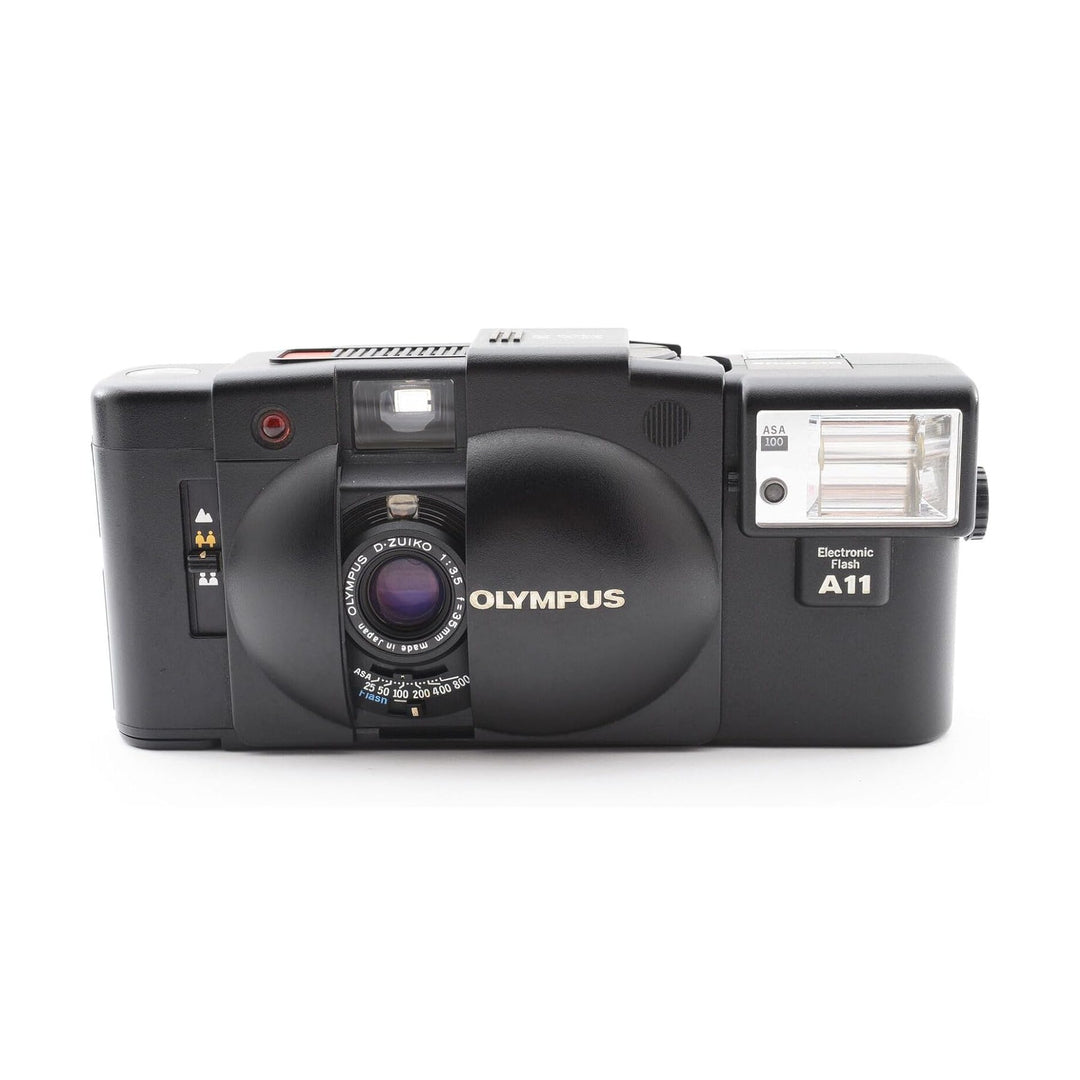Olympus XA black film camera with gold logo and A11 flash by ClubCamera.com