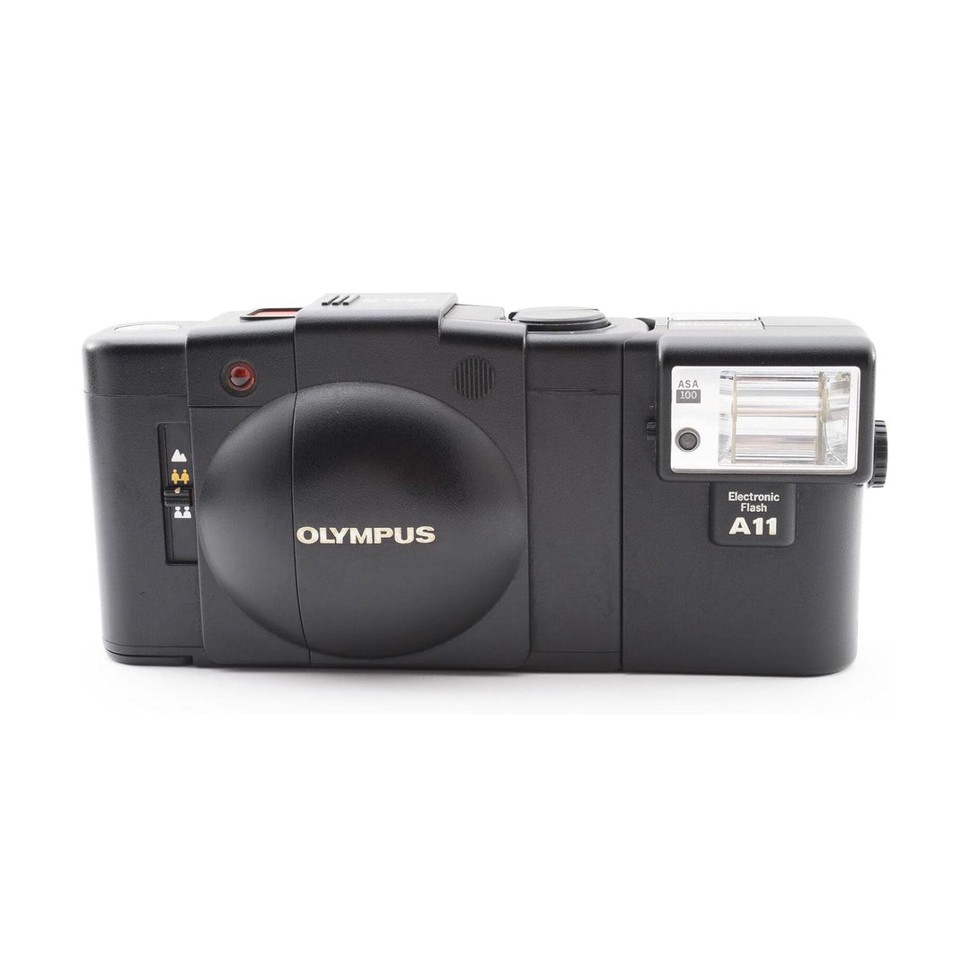 Rear shot of black Olympus XA with gold branding and mounted A11 flash at ClubCamera.com