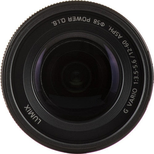 Top down close-up Panasonic LUMIX G VARIO 12-60mm front element glass reflection at ClubCamera.com