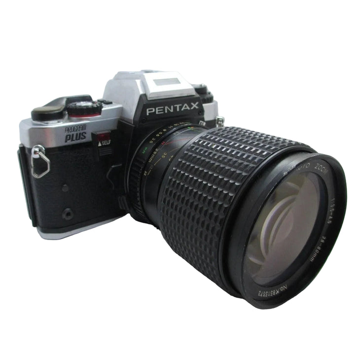 ClubCamera.com front view of Pentax Program Plus 35mm SLR with diamond-pattern grip and self-timer button