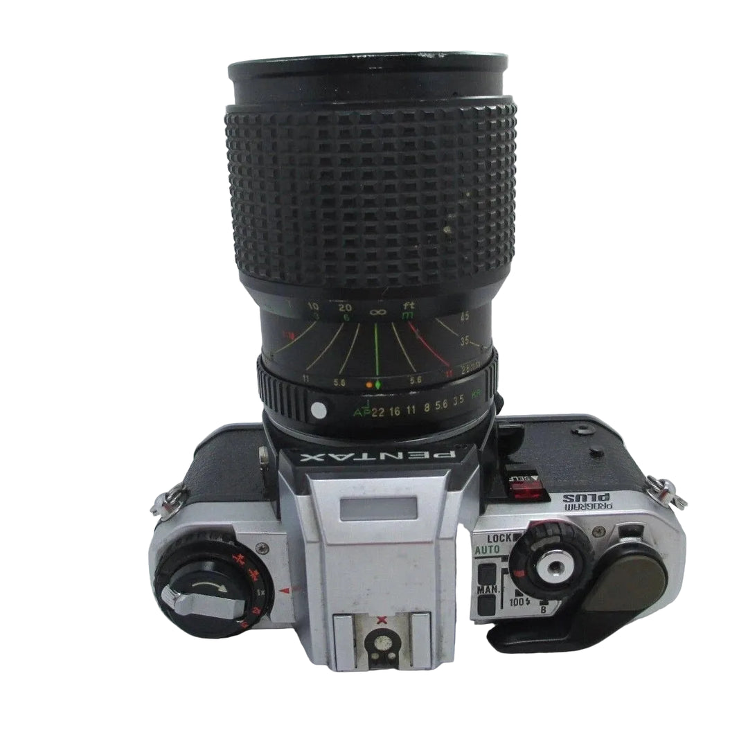 ClubCamera.com Pentax Program Plus silver 35mm SLR camera top view with mode dial and shutter speed selector