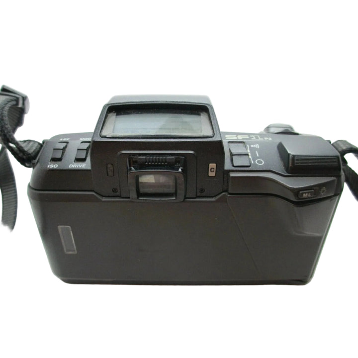 Top view of black Pentax SF1 N autofocus SLR showing ISO drive dials and optical viewfinder at ClubCamera.com