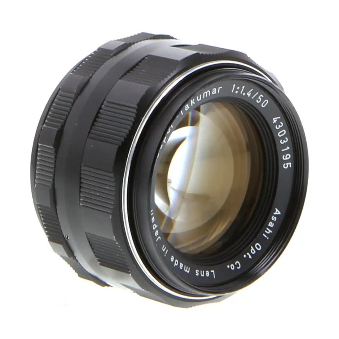 Pentax Asahi Super Takumar 50mm f/1.4 M42 prime lens black metal with engraved text and amber glass by ClubCamera.com