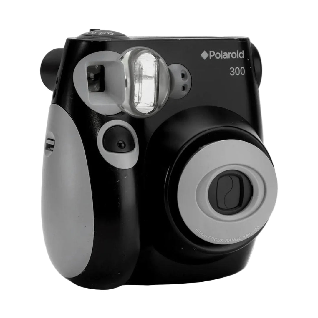 Front three-quarter view of black Polaroid 300 point-and-shoot film camera with gray grip panels and open flash at ClubCamera.com