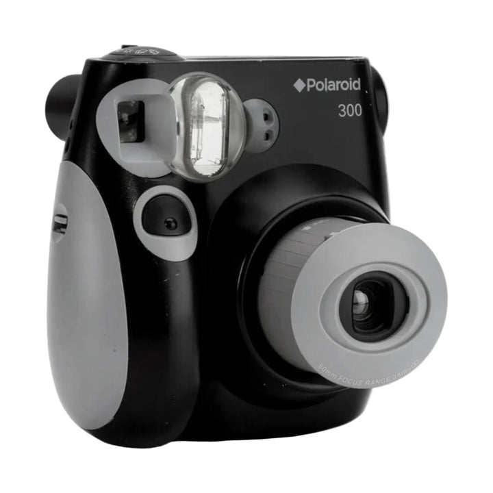 Black and gray Polaroid 300 instant camera on a white background