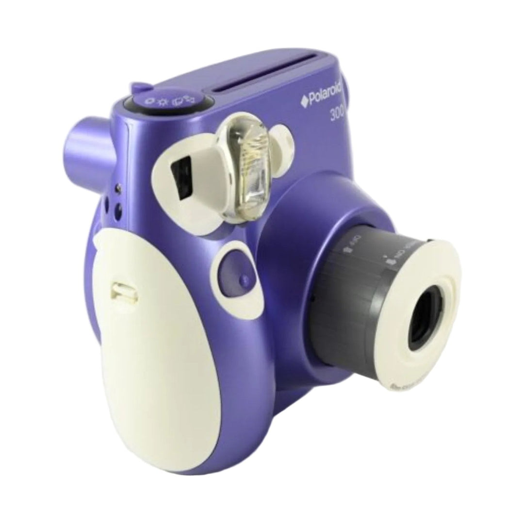 Purple instant camera with white accents on a light gray background