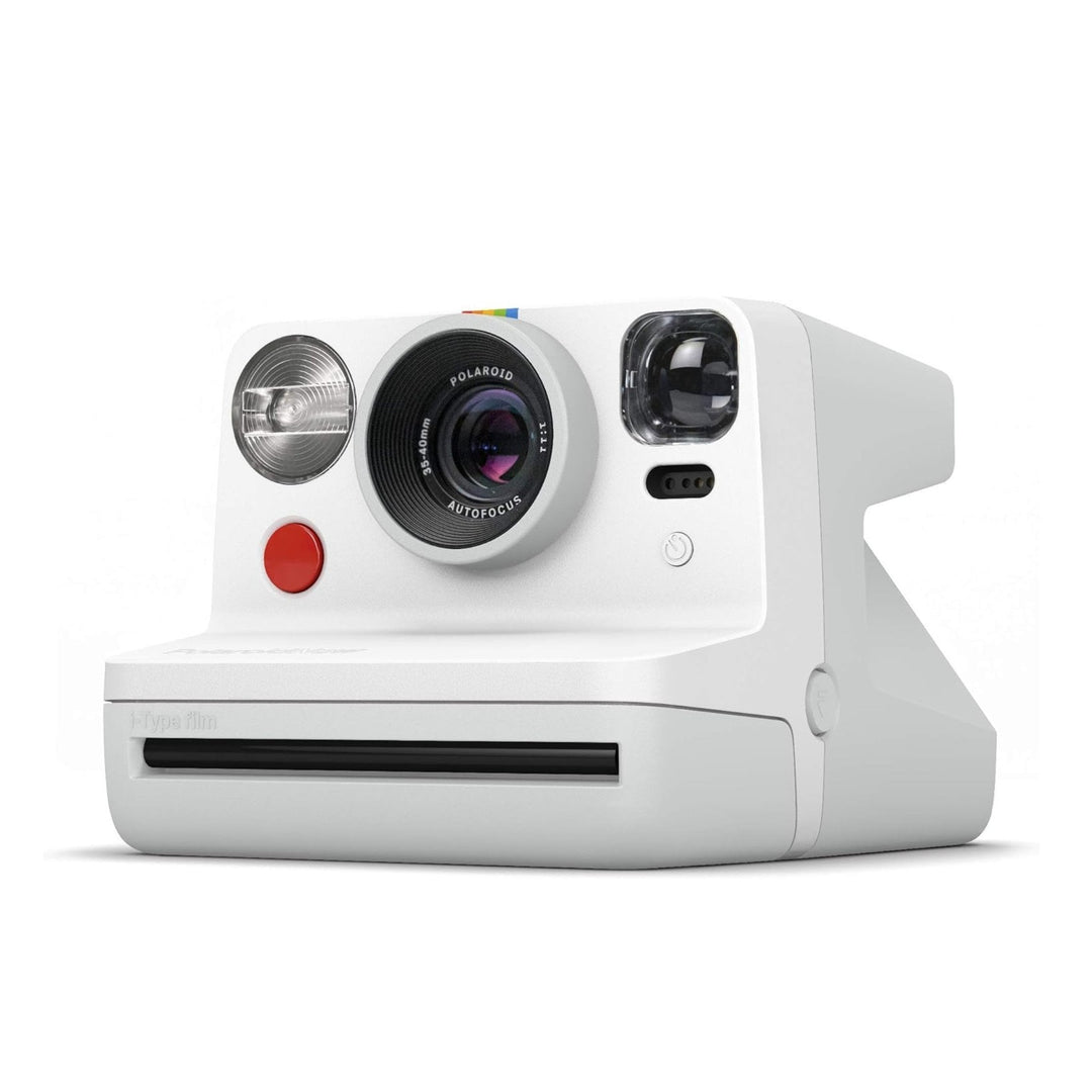 Three-quarter angle of matte white Polaroid Originals Now I-Type instant camera with silver flash and film slot at ClubCamera.com
