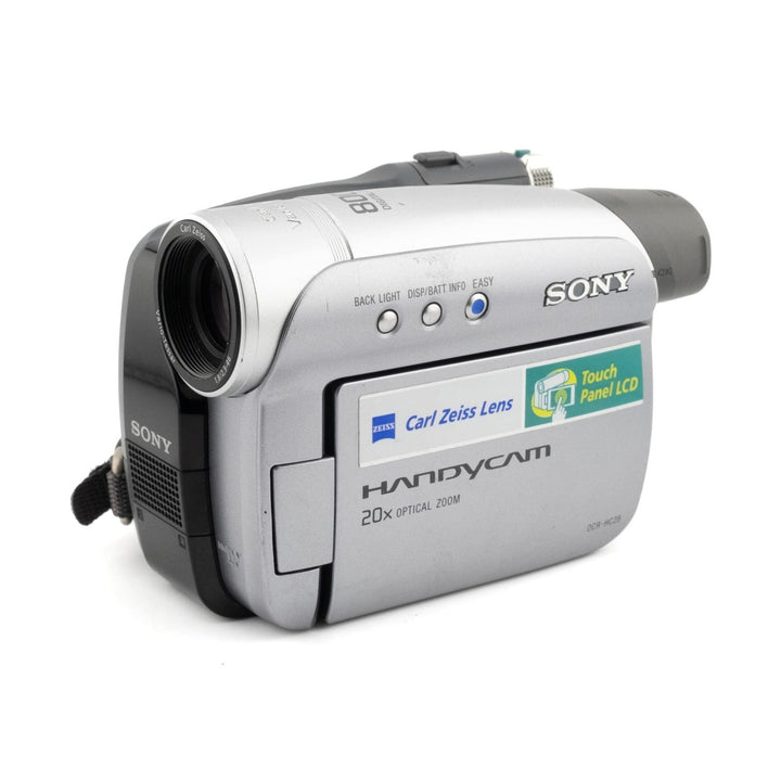 ClubCamera.com front view of silver Sony DCR-HC28 Handycam featuring Carl Zeiss Vario-Sonnar T* lens and Touch Panel LCD