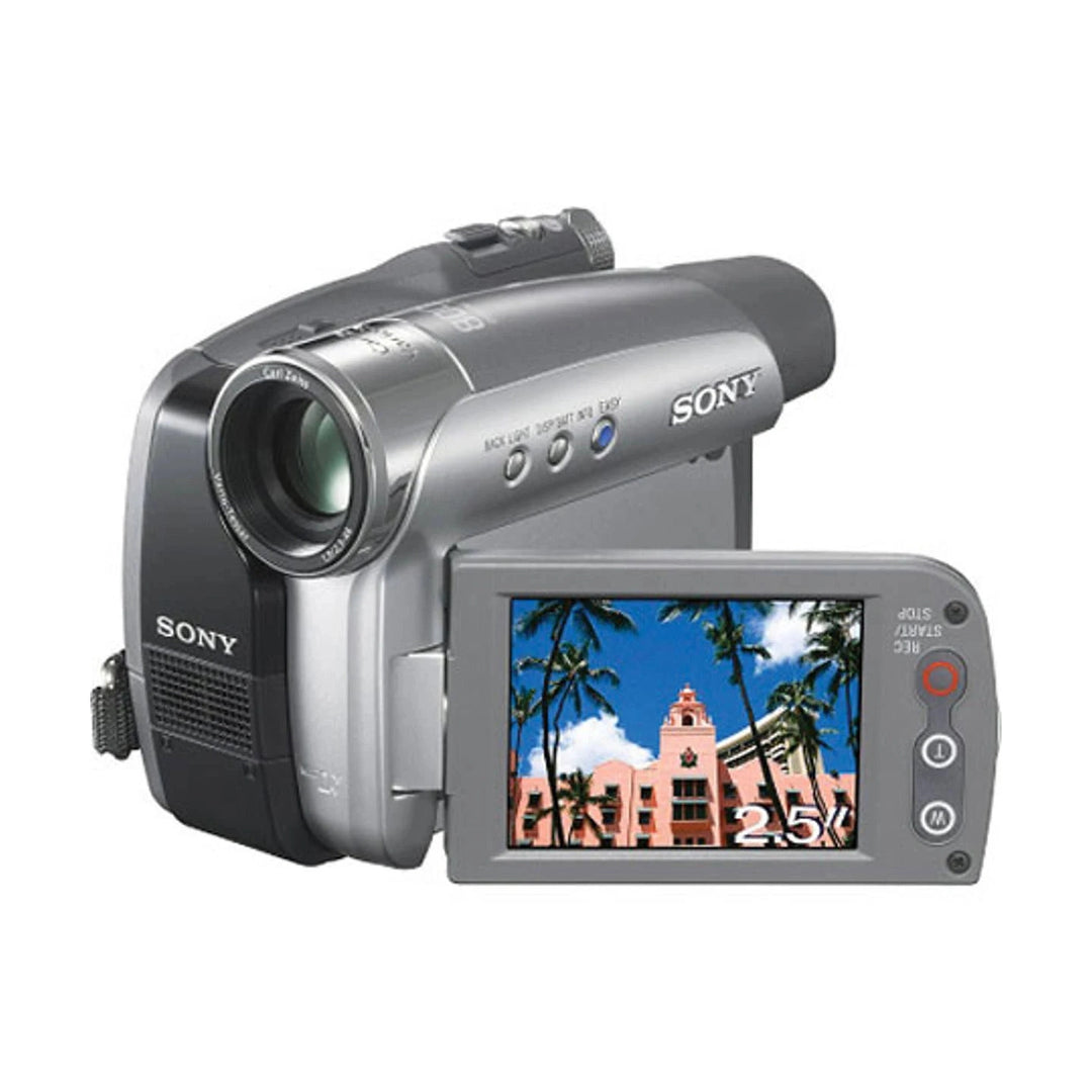 Sony DCR-HC26 MiniDV camcorder in silver and black with 20x zoom lens and swivel LCD showing tropical scene by ClubCamera.com