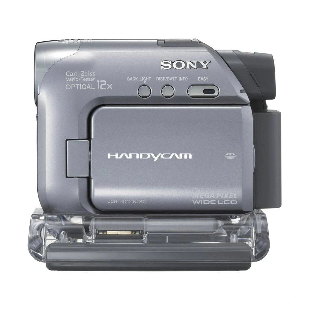 ClubCamera.com rear view of silver Sony DCR-HC42 camcorder displaying HANDYCAM logo and control buttons on dock