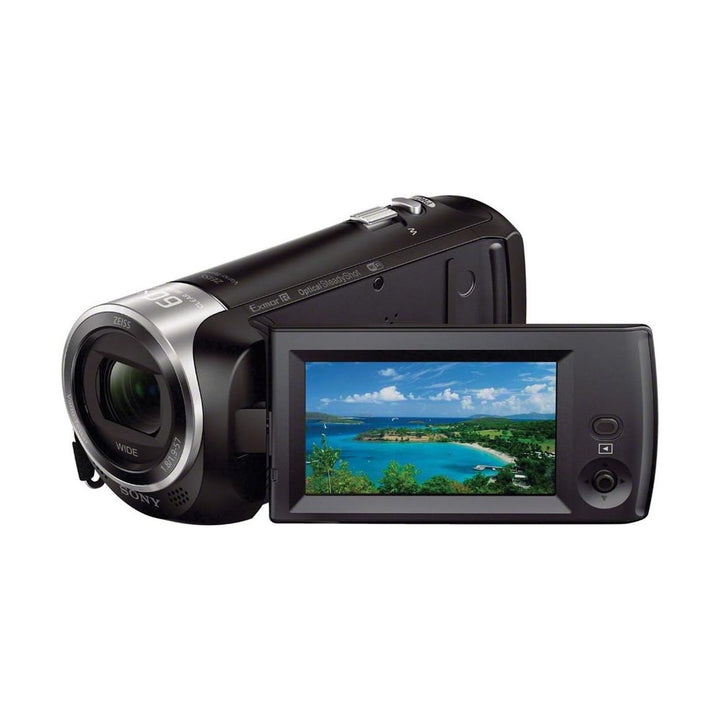 Sony HDR-CX440 camcorder with flip-out LCD screen showing beach preview by ClubCamera.com
