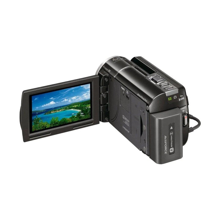 ClubCamera.com Sony HDR-XR160 flip-out LCD screen showing tropical beach scene with ACU-Force grip