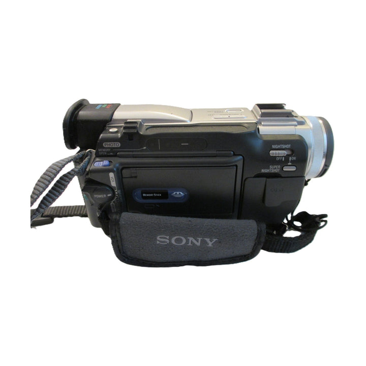 ClubCamera.com Sony DCR-TRV11 camcorder on carrying case showing Memory Stick slot and NightShot switch
