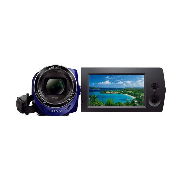 Blue Sony HDR-CX220 camcorder with flip-out LCD screen showing tropical beach scene