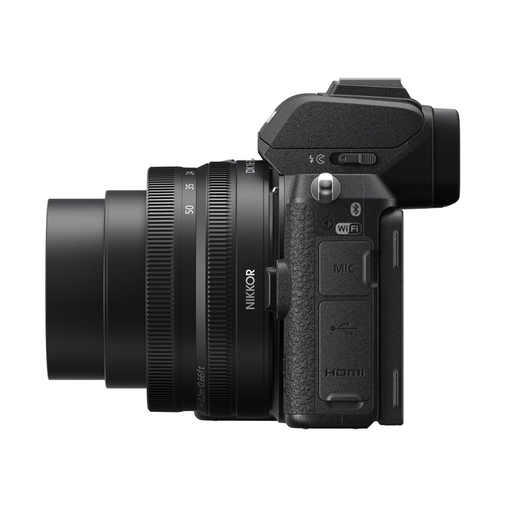 ClubCamera.com black Nikon Z50 mirrorless camera side profile with NIKKOR Z DX 16-50mm VR lens ports and textured grip