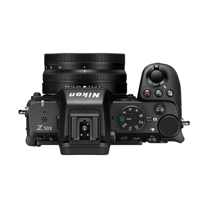 ClubCamera.com black Nikon Z50II top view showing mode dial, ISO button, and 16-50mm lens integration