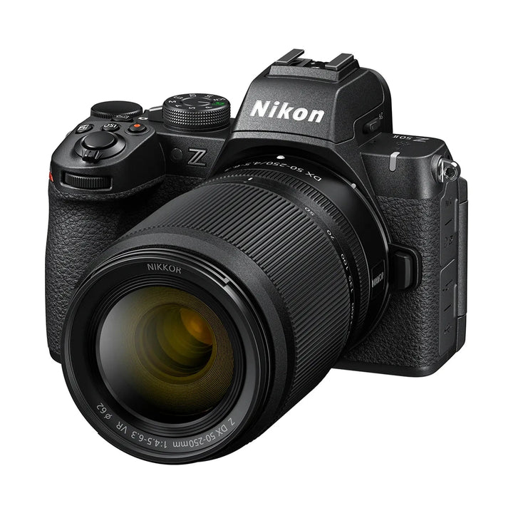 ClubCamera.com Nikon Z50II with 50-250mm telephoto lens highlighting ribbed focus ring and glass reflections