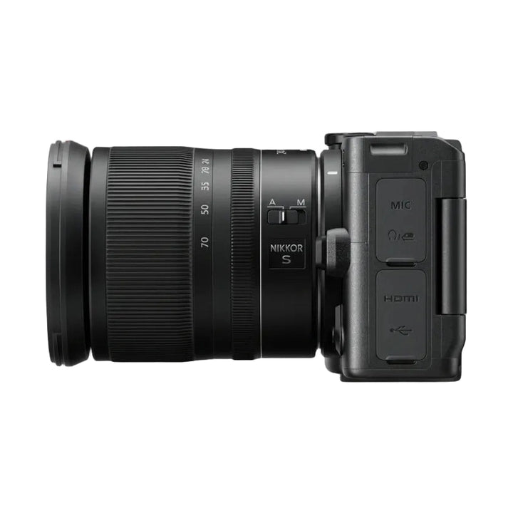 ClubCamera.com Nikon ZR cinema camera side profile with NIKKOR Z 24-70mm lens showing focus ring and rear ports