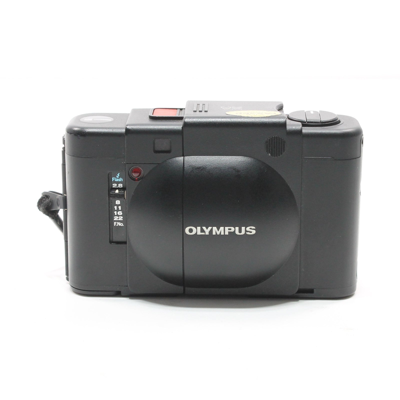 Black Olympus XA rear view with flash sync dial and silver logo at ClubCamera.com
