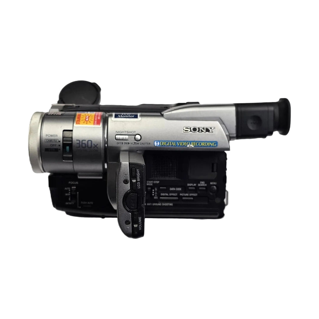 Top view of silver Sony DCR-TRV103 Digital8 Handycam with extended LCD screen and control buttons by ClubCamera.com