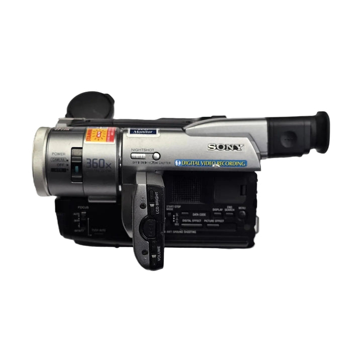 Top view of silver Sony DCR-TRV103 Digital8 Handycam with extended LCD screen and control buttons by ClubCamera.com