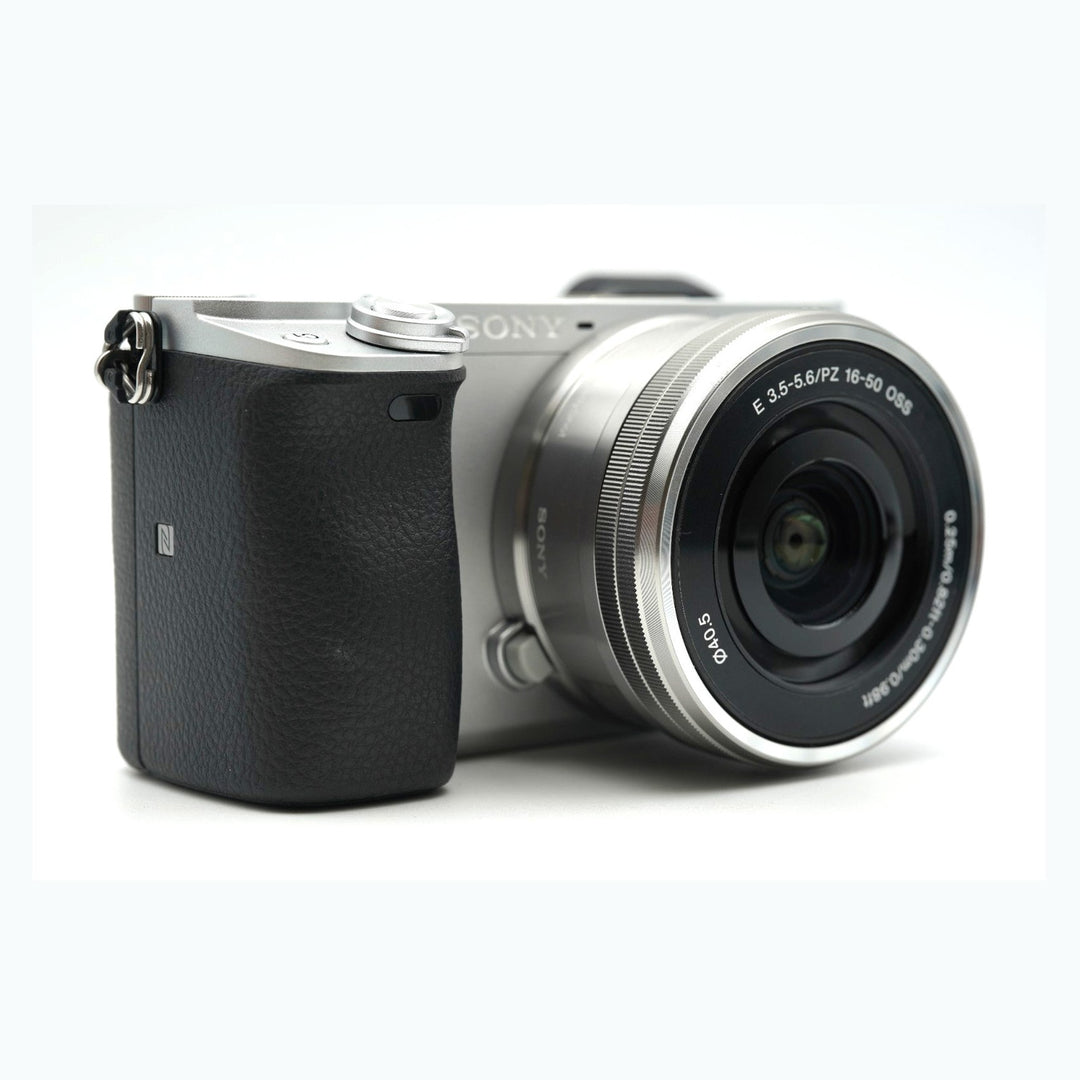 Sony Alpha a6400 Mirrorless Camera with 16-50mm and 55-210mm Lenses (Silver) - side