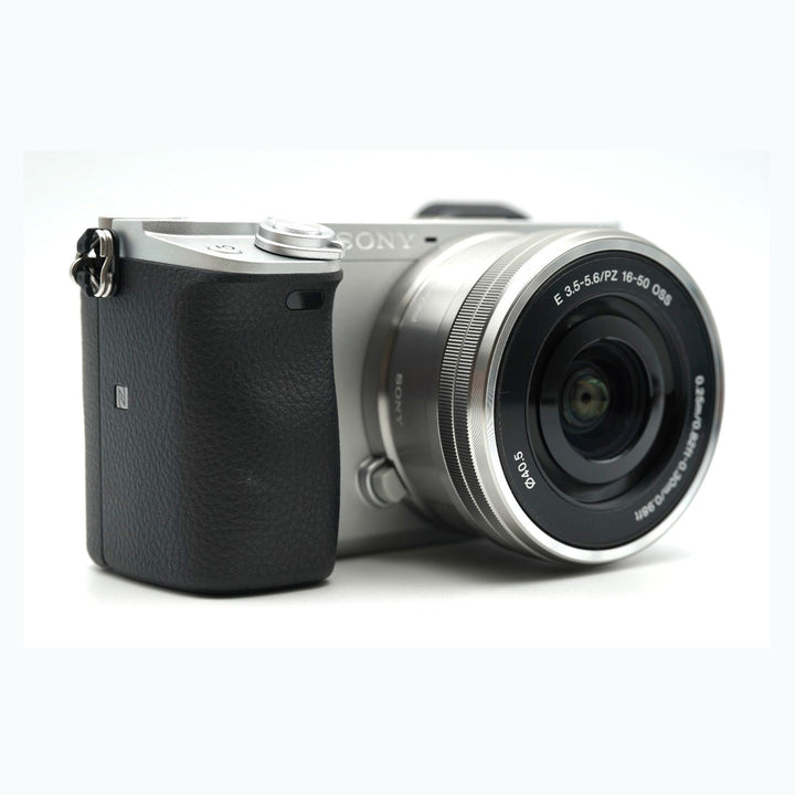 Sony Alpha a6400 Mirrorless Camera with 16-50mm and 55-210mm Lenses (Silver) - side