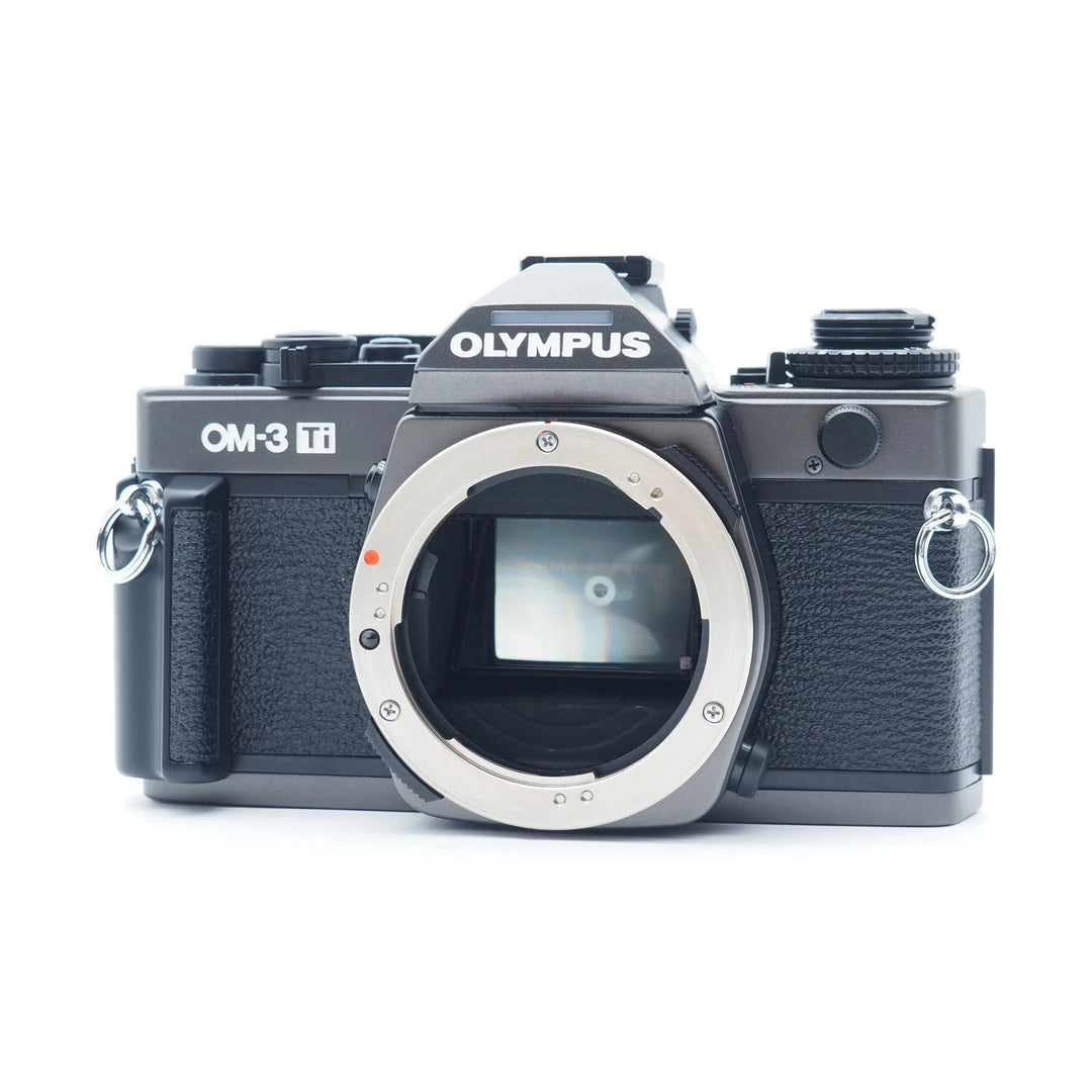 Olympus OM-3 Ti manual SLR film camera black with exposed lens mount and internal mirror at ClubCamera.com
