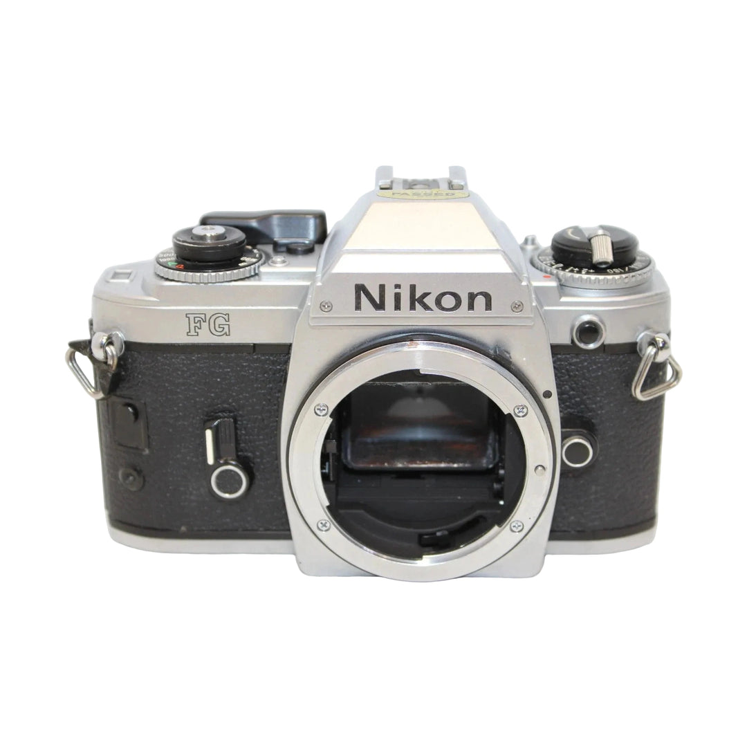 Nikon FG 35mm SLR film camera silver black with open F-mount bayonet and PASSED sticker at ClubCamera.com