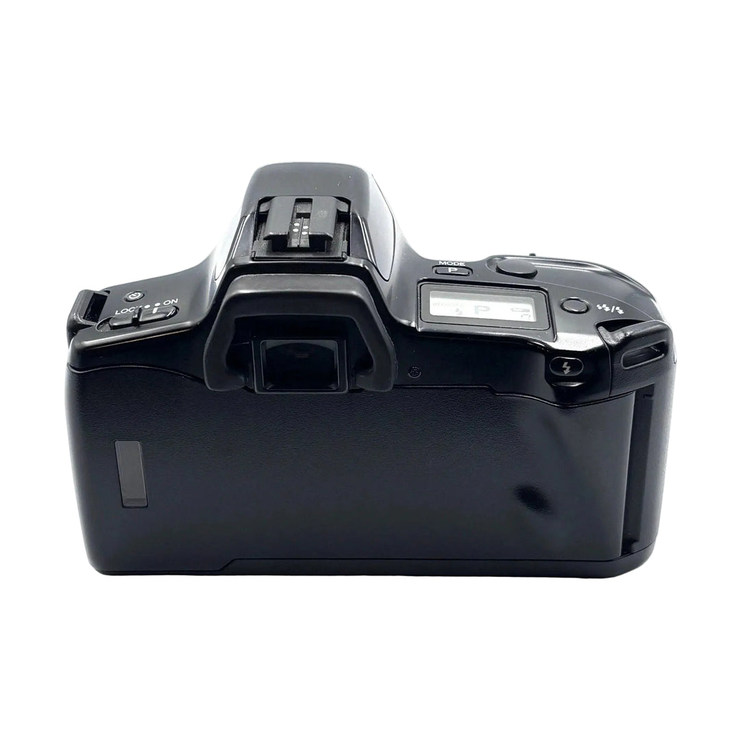 Rear view of Minolta Maxxum 3xi black SLR displaying LCD panel, hot shoe, and ergonomic grip at ClubCamera.com