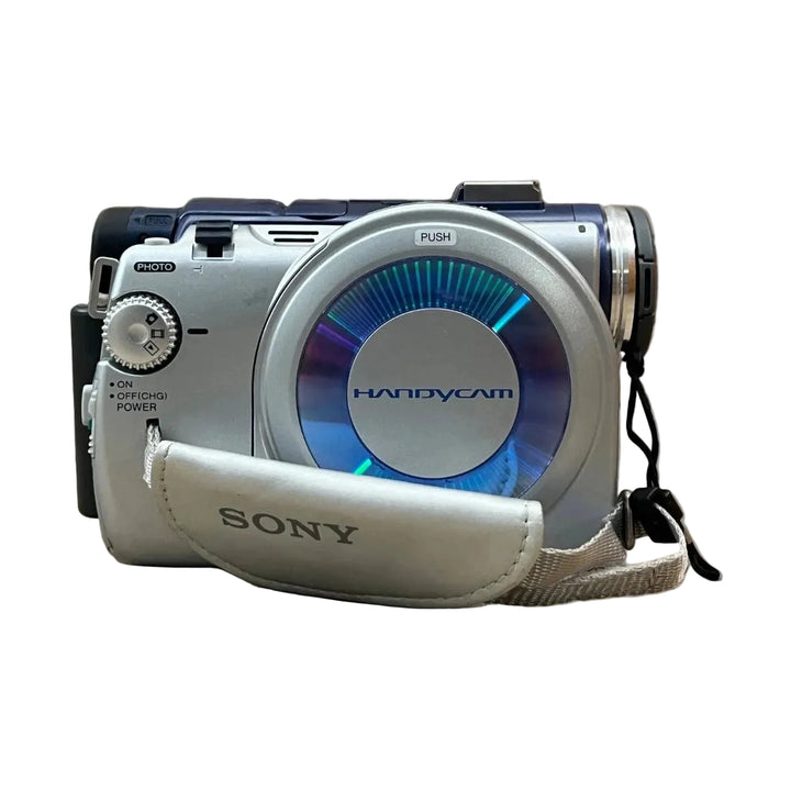 ClubCamera.com silver Sony DCR-DVD200 Handycam with open disc slot revealing blue-green radial pattern