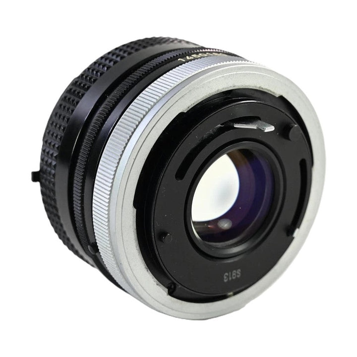 Canon FD 50mm f/1.8 lens with silver bayonet mount and purple coating at ClubCamera.com