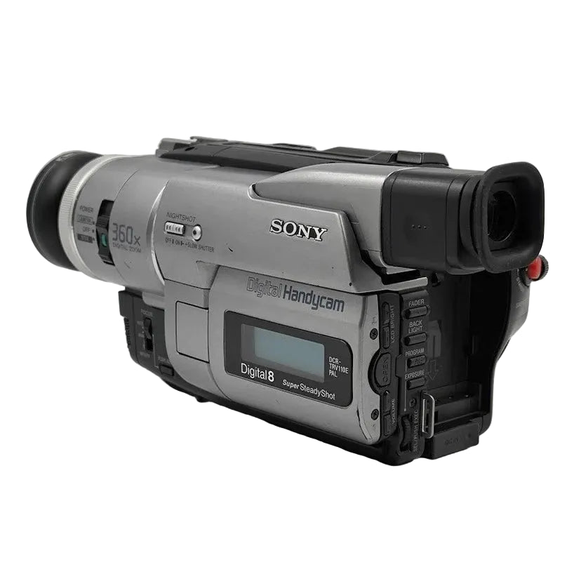 ClubCamera.com angled shot of silver and black Sony DCR-TRV110 Digital8 Handycam highlighting lens assembly and LCD screen