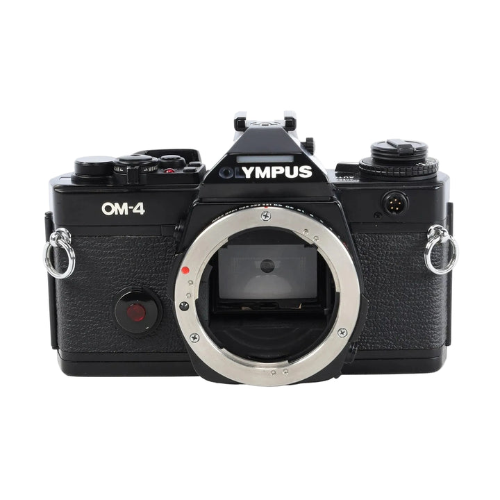 Olympus OM-4 black SLR film camera body front view with silver mount ring and textured grip at ClubCamera.com