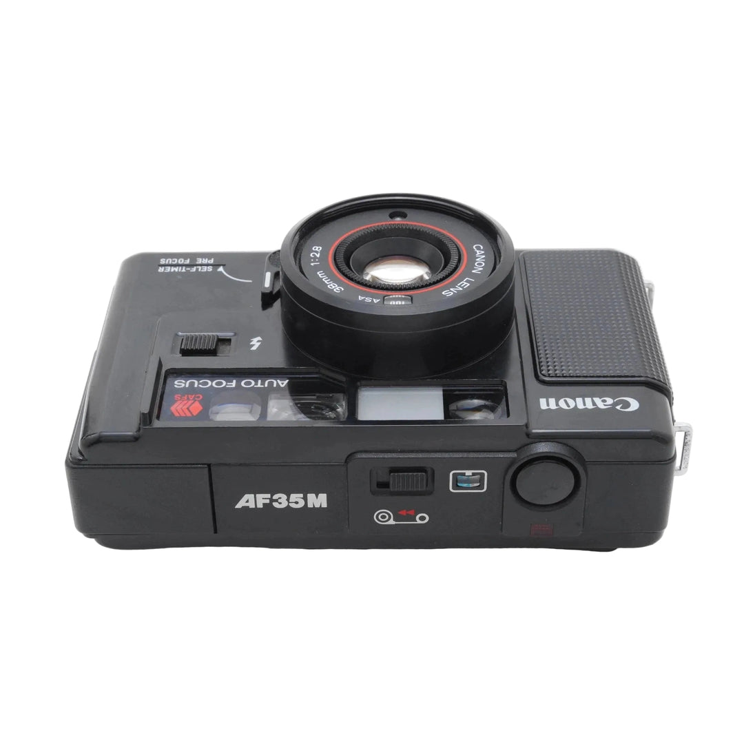 Canon AF35M Sure Shot vintage autofocus 35mm film camera black front view with red lens ring at ClubCamera.com