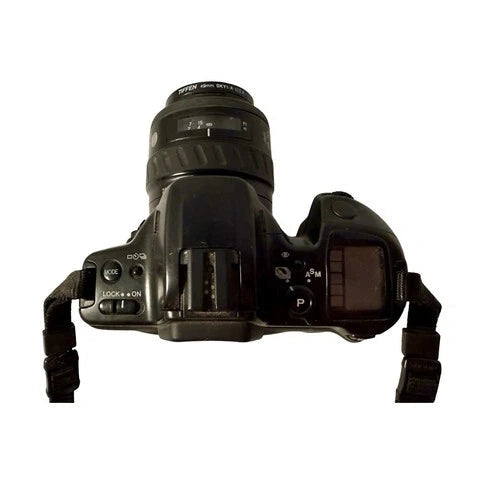 Top view of Minolta Maxxum 450si mode dial and pentaprism at ClubCamera.com