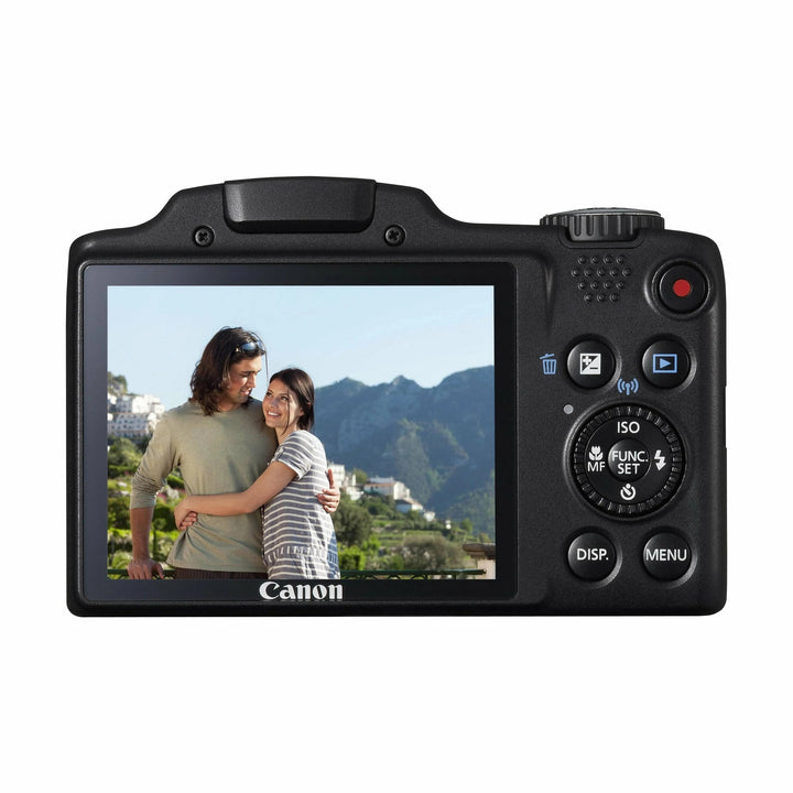Rear view of Canon PowerShot SX510 HS showing LCD screen and mode dial at ClubCamera.com