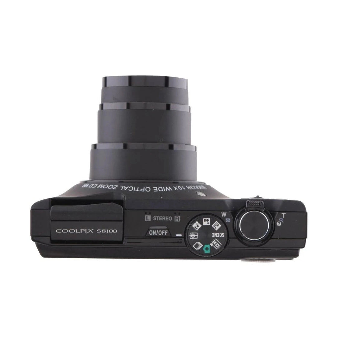 Top-down view of ClubCamera.com black Nikon Coolpix S8100 featuring mode dial and stereo microphone ports