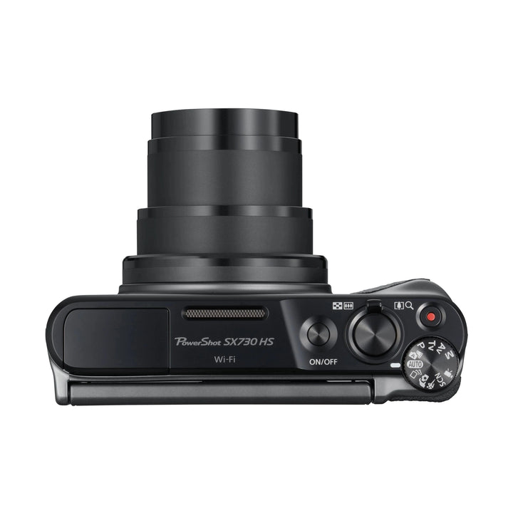 ClubCamera.com top view of black Canon PowerShot SX730 HS rear control dial and extended matte zoom lens